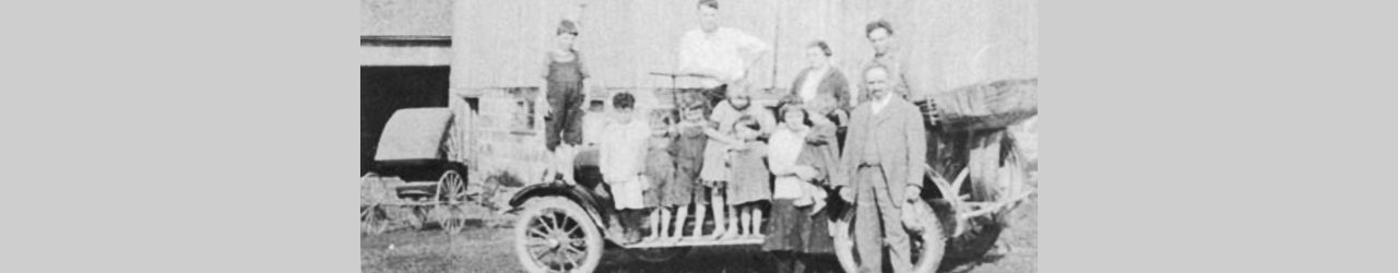 Bow Family and Friends on Car, 1920 (Wilmer at Left, Alex at Right)